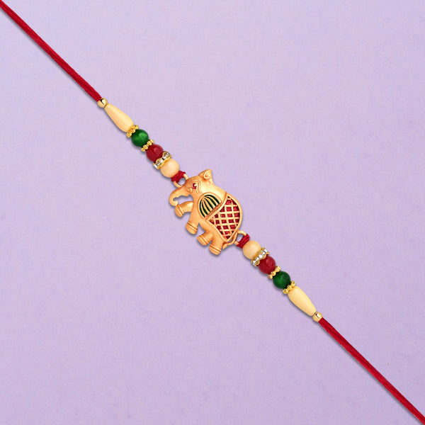Golden Elephant Rakhi With Red Green Moti