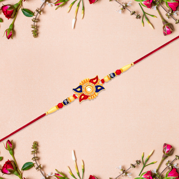 Designer Sun Motif Rakhi With Red And Blue Enamel Work