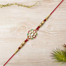 Kundan Work Floral Rakhi With Red Thread